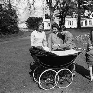 Queen Elizabeth II with her husband Prince Philip and their children Prince Charles
