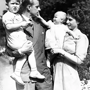 Queen Elizabeth II and her husband Prince Philip with their two children Prince Charles