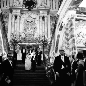 Queen Elizabeth II leading a procession down the fantastic staircase of Augustusburg Queen Elizabeth II leading a procession down the fantastic staircase of Augustusburg