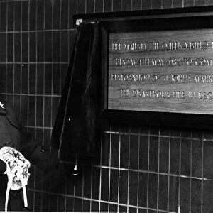 Queen Elizabeth II, in Liverpool, unveiling a plaque to commemorate the restoration of