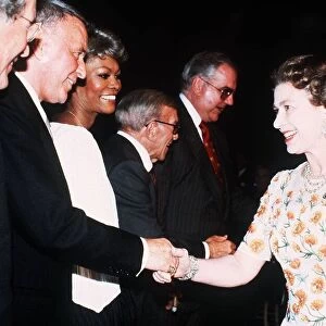 Queen Elizabeth II meeting singer Frank Sinatra at the studios of Twentieth Century Fox