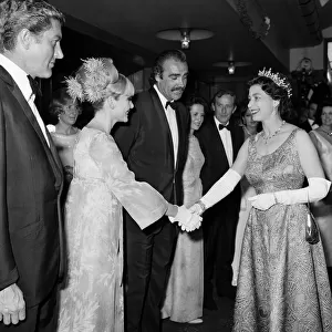 Queen Elizabeth II meets Sean Connery and Diane Cilento at the premiere of