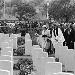 Queen Elizabeth II and Prince Philip, Duke of Edinburgh visit Massicault War Cemetery in