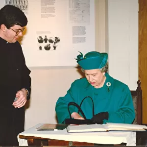 Queen Elizabeth II and Prince Philip visit the North East 18 May 1993 - The Queen signing