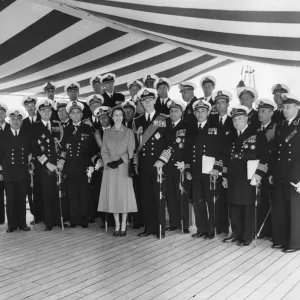 Queen Elizabeth II and Prince Philip with visiting foreign Naval officers Queen Elizabeth II and Prince Philip with visiting foreign Naval officers