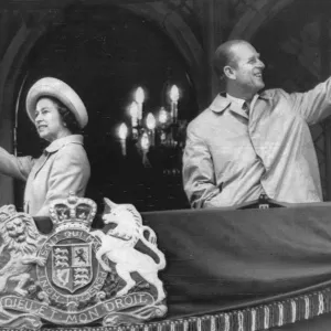 Queen Elizabeth II and Prince Philip wave to the crowds from a balcony at Durham Town Queen Elizabeth II and Prince Philip wave to the crowds from a balcony at Durham Town
