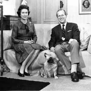 Queen Elizabeth II, Princess Elizabeth with Prince Philip and one of the family corgi