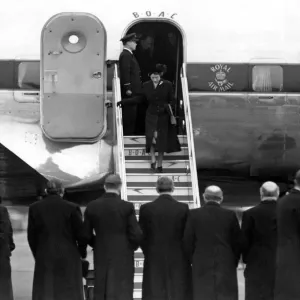 Queen Elizabeth II, Princess Elizabeth steps from her plane at London Airport after being Queen Elizabeth II, Princess Elizabeth steps from her plane at London Airport after being