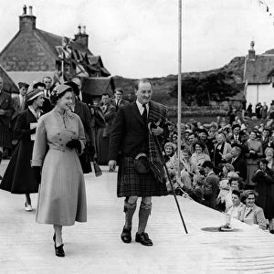 Queen Elizabeth II returns to the jetty at Iona, off the western coast of Scotland