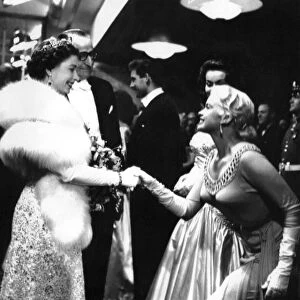 Queen Elizabeth II at the Royal Film Performance, hollywood film star Jayne Mansfield