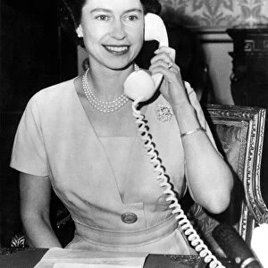 Queen Elizabeth II speaking to the Prime Minister of Canada, Mr Diefenbaker