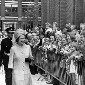 Queen Elizabeth II visits Manchester. The Queen walks through the Manchester Evening News Queen Elizabeth II visits Manchester. The Queen walks through the Manchester Evening News