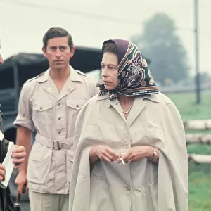 Queen Elizabeth II (with Prince Charles behind), attends the 1976 Olympic Games in Canada