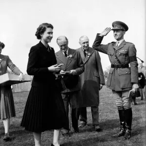 Queen Elizabeth with Major JWC Weldon at Badmington Horse trials. May 1953
