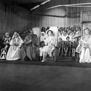 Queen Elizabeth - The Queen and the Duke clapping one of the competitors in the Osborne