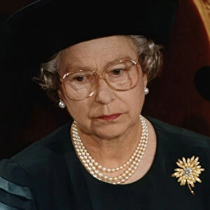 Queen Elizabeth wearing glasses Recent family problems take their toll on her