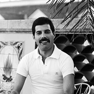 Queen lead singer Freddie Mercury seen here relaxing in a roof top garden in New Orleans