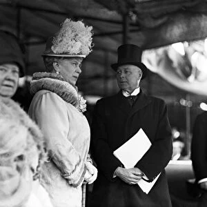 Queen Mary with British Home Secretary Sir William Joynson-Hicks as King George V opens