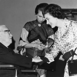 The Queen meets Charlie Chaplin at the British Academy of Film and Television Arts Print The Queen meets Charlie Chaplin at the British Academy of Film and Television Arts Print