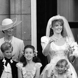 Queen Mother with Duke and Duchess of York on the balcony at Buckingham Palace after