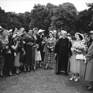 The Queen Mother in the gardens of Lambeth Palace 1955 with the Archbishop of