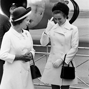 The Queen and Princess Anne waiting to board the plane for a 10 day visit to Canada
