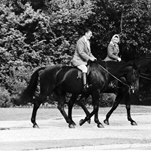 The Queen riding beside President Reagan at Windsor. June 1982