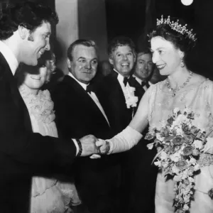 The Queen Shaking Hands with Tom Jones Print 13th May 1968 The Queen Shaking Hands with Tom Jones Print 13th May 1968