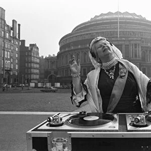 A Queen Victoria lookalike DJ-ing outside the Royal Albert Hall 9th March 1987