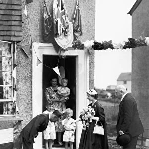 The Queen visits a war veteran during her Coronation tour of Scotland in 1953