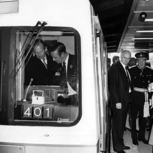 Print of The Queen waits while Prince Philip takes a tram driving lesson Print of The Queen waits while Prince Philip takes a tram driving lesson
