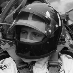 Racing driver Graham Hill at Brands hatch circuit 1970 sitting in Lotus car in Racing driver Graham Hill at Brands hatch circuit 1970 sitting in Lotus car in