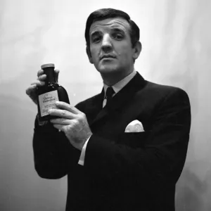 Radio DJ Alan Freeman holding a bottle of Mersey water February 1964 Radio DJ Alan Freeman holding a bottle of Mersey water February 1964