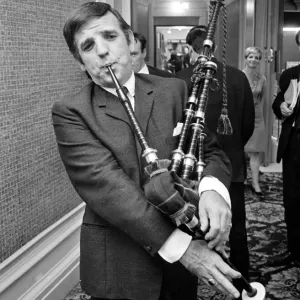 Radio DJ Alan Freeman playing the bagpipes 22nd August 1966 Neg Radio DJ Alan Freeman playing the bagpipes 22nd August 1966 Neg