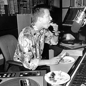 Radio One DJ Simon Mayo on the breakfast show in the London studio