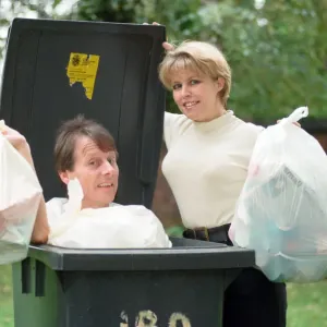 Radio presenters Tony Wadsworth and Julie Mayer are pictured with some rubbish Radio presenters Tony Wadsworth and Julie Mayer are pictured with some rubbish