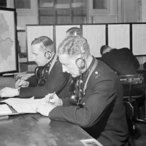 Radio and telegraph officers on duty in Scotland Yards information room