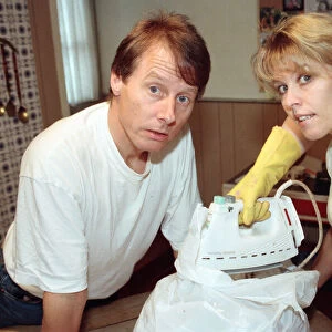 Radio WM presenters Tony Wadsworth and Julie Mayer pictured with an iron