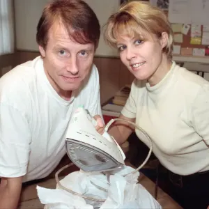 Radio WM presenters Tony Wadsworth and Julie Mayer pictured with an iron
