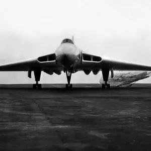 A RAF Avro Vulcan V-bomber touches down and brakes using it A RAF Avro Vulcan V-bomber touches down and brakes using it