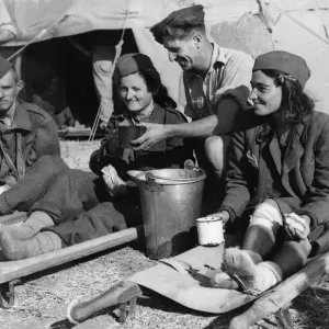 Print of RAF personnel assisting wounded partisans in Italy Print of RAF personnel assisting wounded partisans in Italy