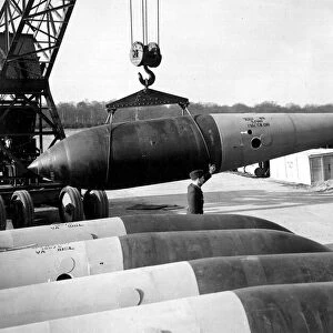 An RAF Grand Slam bomb being hoisted from the bomb dump during World War Two May
