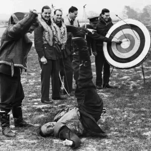 RAF pilots and crew enjoy some time out between missions with a round of archery at their RAF pilots and crew enjoy some time out between missions with a round of archery at their