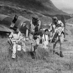 An RAF squadron took over the airfield from the Japanese, the children, who are brothers
