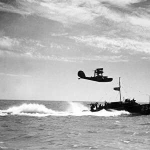 An RAF Supermarine Walrus Seaplane acting as spotter for Air Sea Rescue launch