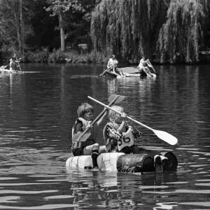 A raft race in Pangbourne, Berkshire. June 1976