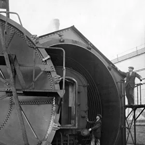 Railway carriages. The plant at Swindon showing carriage in cylinder ready to be sealed