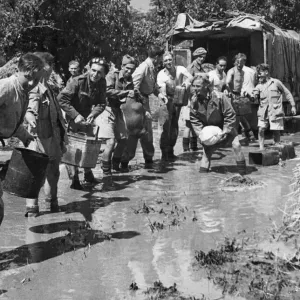 Rain floods an 8th army sector in Italy. (Picture) Priority salvage