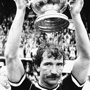Rangers and Scotland football player Graeme Souness with the Sir Stanley Rous Trophy