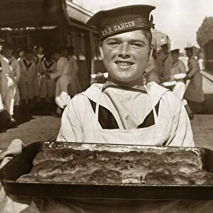A rating at the Royal Navy training base HMS Ganges collects the food for lunch for his